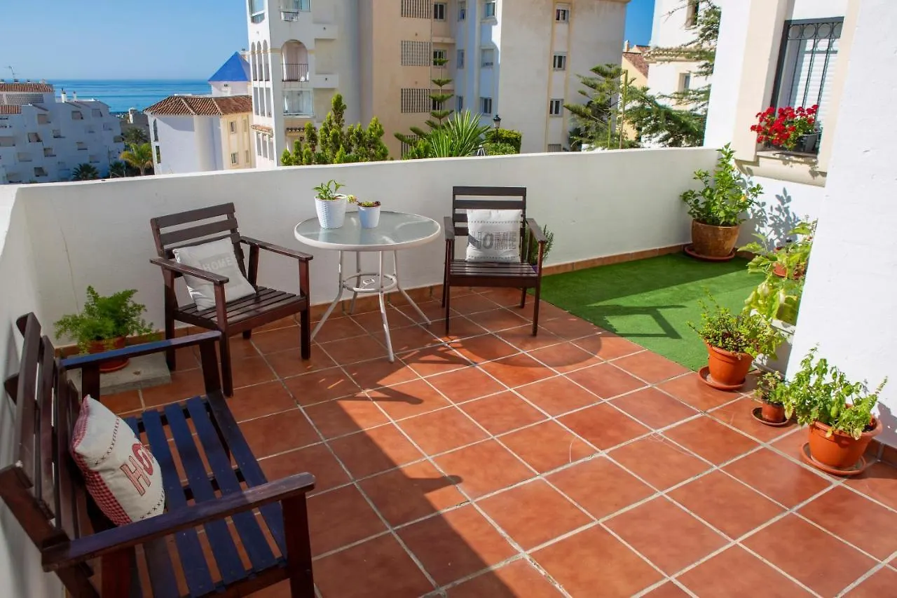 Seaside Terrace: 2-Bedroom Apartment with Pool and Ocean Views Estepona