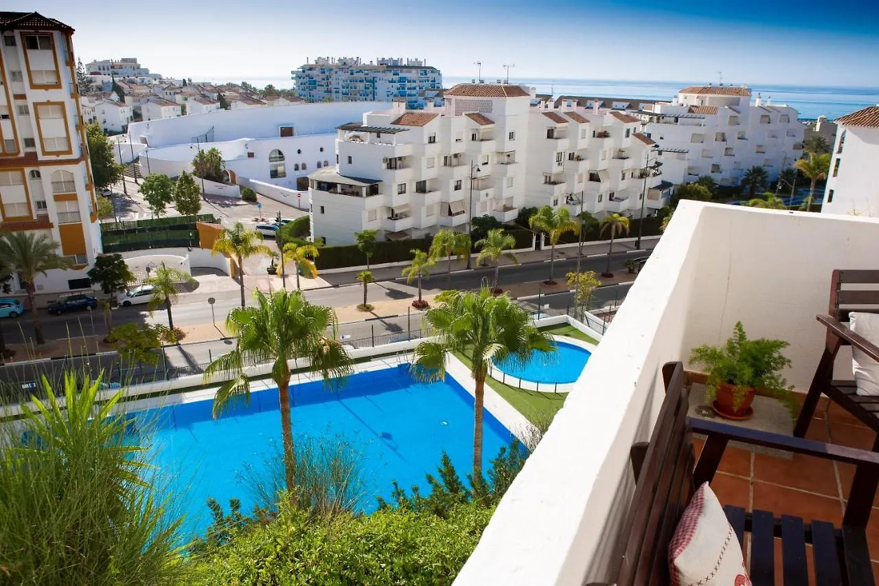 Seaside Terrace: 2-Bedroom Apartment with Pool and Ocean Views Estepona Spain