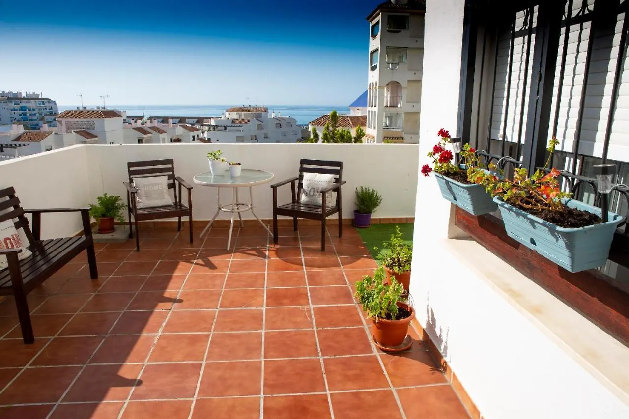 Seaside Terrace: 2-Bedroom Apartment with Pool and Ocean Views Estepona